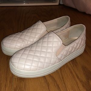 Pink Skechers slip on sneakers